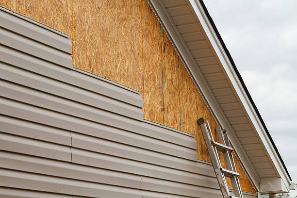 Professional Fiber Cement Siding technician working in Cedarhurst, NY